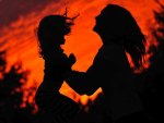 Silhouettes of a Mother and her Child