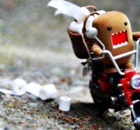 Domo on a bike