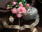 Pink roses and silver box