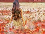 Girl in poppi field