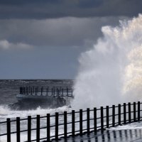 wave breaking at seawall