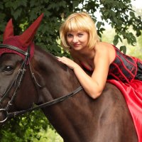 *** A beautiful woman on horseback ***