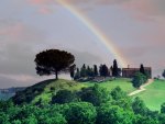 rainbow over a tuscan farm