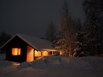 Snowy Log Cabin in Winter
