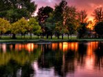 sunset on a lakeside park hdr
