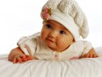 Cute baby with white cap