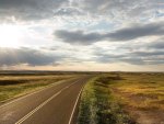 sunshine on highway in the plains