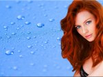 Beautiful Redhead With Blue Background