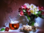 Tea, cookies and flowers