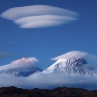 wondrous clouds over volcanoes
