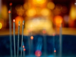 BURNING INCENSE STICKS