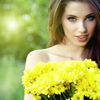 Beautiful Girl Holding Yellow Flowers