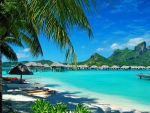 St Regis Resort Bora Bora beach blue lagoon and water villas