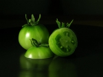 REFLECTION OF GREEN TOMATOES