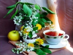 Tea , fruit  and  flowers