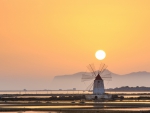 windmill in sicily on a salt farm