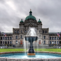 fountain in front of government building in victoria canada hdr