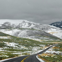 highway on rolling hills in winter