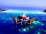 Table for Two on Lit Pool