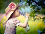 Little girl and lilac - spring life
