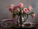 Pink roses and cup of tea