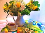 Spring flowers and cup of tea