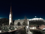 church and cemetery in an alpine town