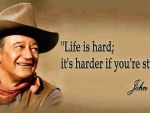 JOHN WAYNE AS A COWBOW