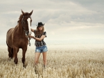 Cowgirl In A Field