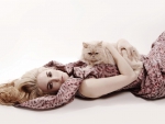 Model lying with cat