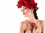 Beauty with a hat of red roses