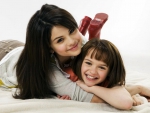 Selena Gomez with a cute kid.