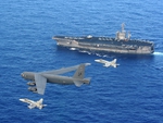 Two F-18s and a B-52 W/Nimitz