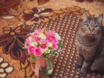 Kitten and bouquet