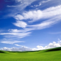 Green and Cloudy Sky wallpaper