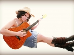 Cowgirl With Her Guitar
