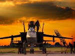 MiG 31 and its Ground Crew at Sunset