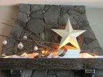 Rustic fireplace with Christmas decor