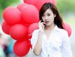 Dashing beauty w/ balloons