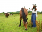 Cowgirl and Her Horses