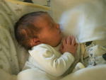 Baby praying in sleep