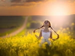 Little girl in a flower field