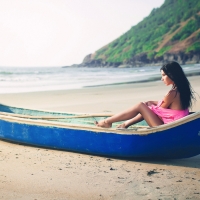 Vera posing in a Boat