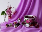 Cup of tea in purple background