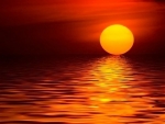 Liquid Sun Rippling water and an Orange sunset