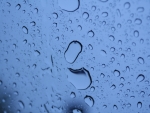 Water drops on glass-rain day