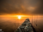 Sunrise by the anyient pier