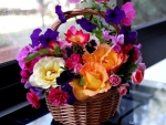 Basket with colorful flowers