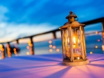 Lantern on table at twilight sky