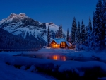 Cottage in winter mountain